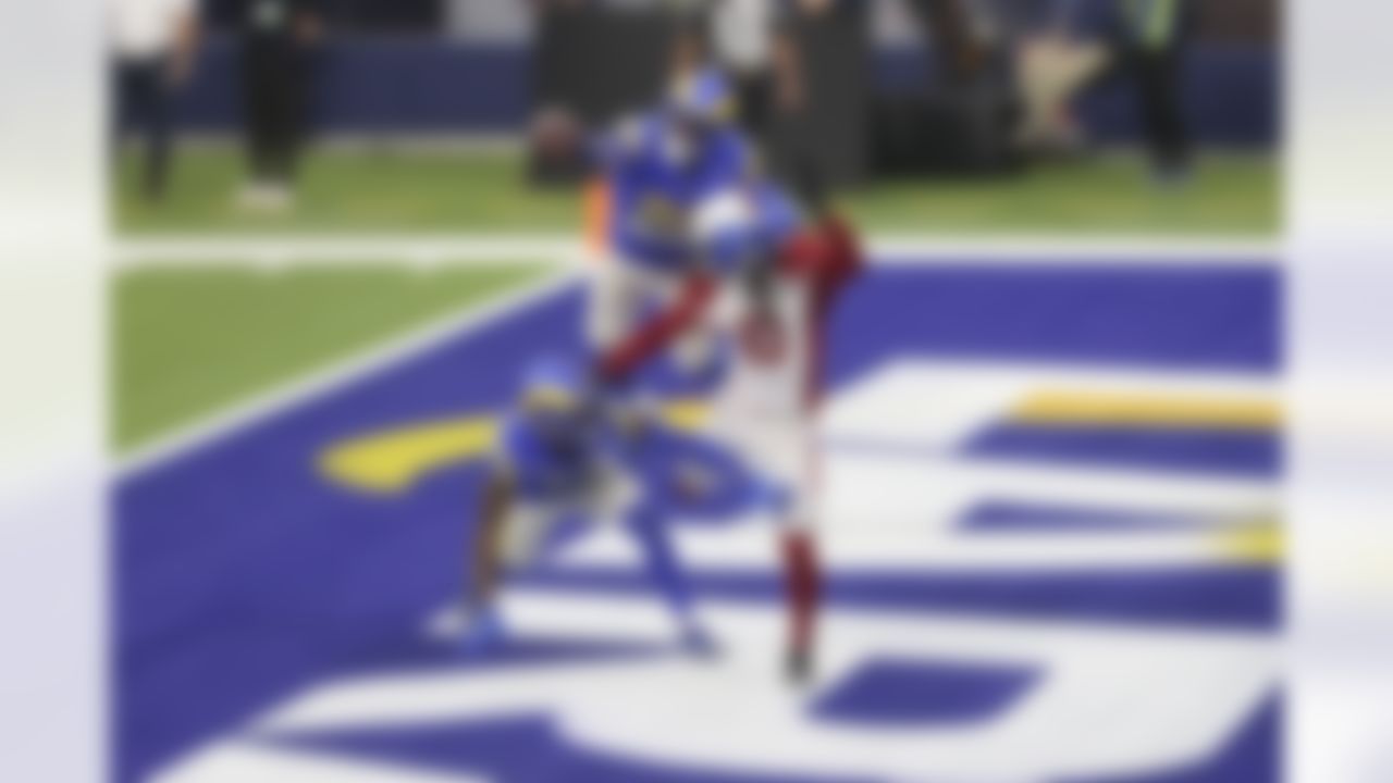 Los Angeles Rams cornerback Jalen Ramsey (20) breaks up a pass intended for Arizona Cardinals wide receiver DeAndre Hopkins (10) during an NFL football game on Sunday, January 3, 2021 in Inglewood, California.