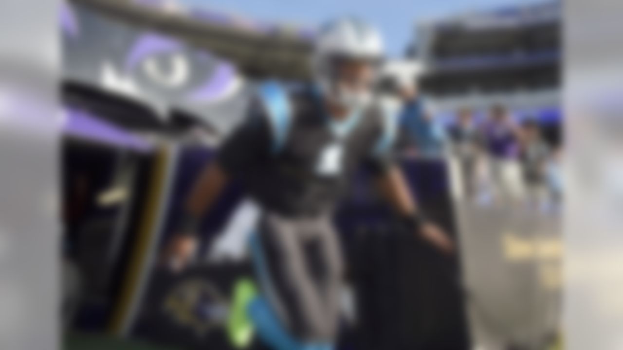 Carolina Panthers quarterback Cam Newton jogs onto the field before the team's NFL preseason football game against the Baltimore Ravens, Thursday, Aug. 11, 2016, in Baltimore. (AP Photo/Nick Wass)