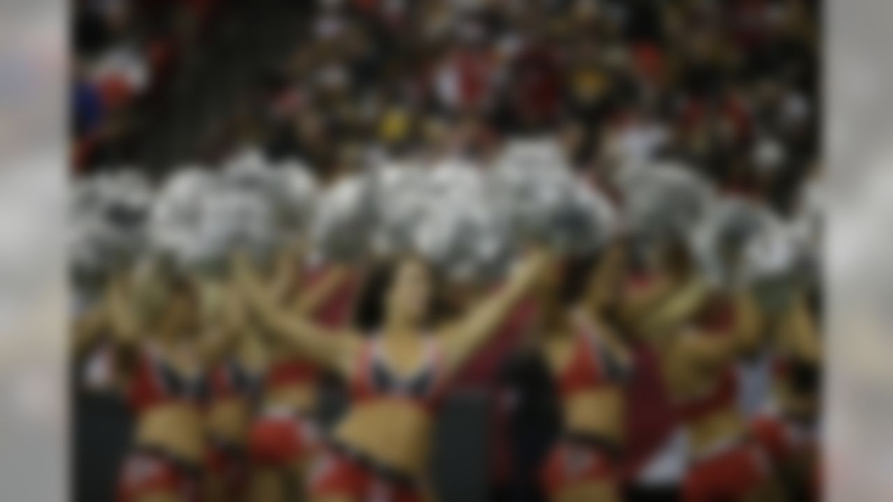 Atlanta Falcons cheerleaders perform against the Pittsburgh Steelers during the first half of an NFL football game, Sunday, Dec. 14, 2014, in Atlanta. (AP Photo/Brynn Anderson)