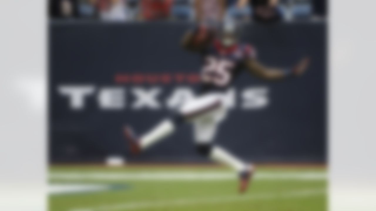 Houston Texans cornerback Kareem Jackson dances into the end zone for a touchdown after an interception during the fourth quarter of an NFL football game against the Tennessee Titans, Sunday, Sept. 30, 2012, in Houston. The Texans won 38-14. (AP Photo/Dave Einsel)