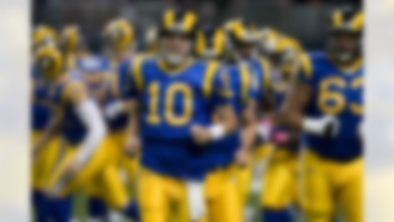 St. Louis Rams quarterback Marc Bulger (10) leads his teammates off of the field before an NFL football game against the Minnesota Vikings Sunday, Oct. 11, 2009, in St. Louis. (AP Photo/Tom Gannam)