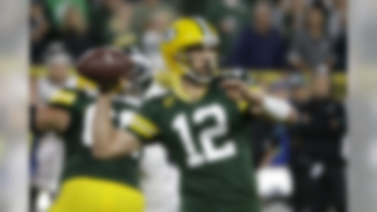 Green Bay Packers quarterback Aaron Rodgers drops back to pass during the first half of the team's NFL football game against the Philadelphia Eagles on Thursday, Sept. 26, 2019, in Green Bay, Wis. (AP Photo/Mike Roemer)