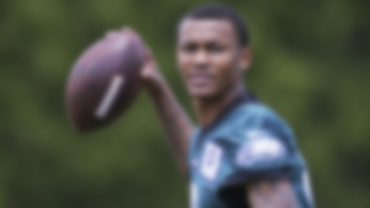 Wide receiver DeVonta Smith tosses the ball during rookie minicamp at the NFL football team's training facility, Friday, May 14, 2021, in Philadelphia.