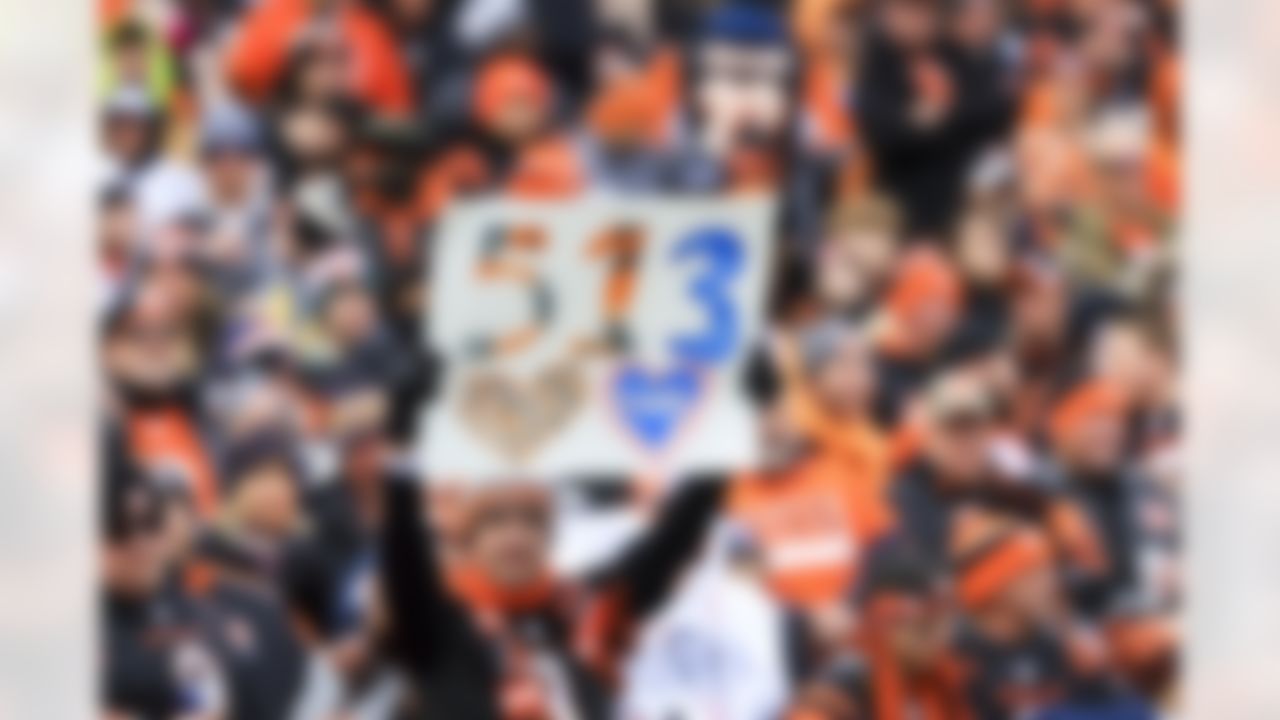 A Cincinnati Bengals fan holds up a sign honoring Buffalo Bills safety Damar Hamlin (3) during an NFL football game between the Baltimore Ravens and Cincinnati Bengals on Sunday, January 8, 2023 in Cincinnati, Ohio.