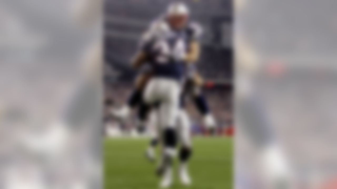 New England Patriots running back Sammy Morris (34) is congratulated by teammates after scoring a touchdown during the second quarter of an NFL football game against the Denver Broncos, Monday, Oct. 20, 2008, in Foxborough, Mass. (AP Photo/Michael Dwyer)