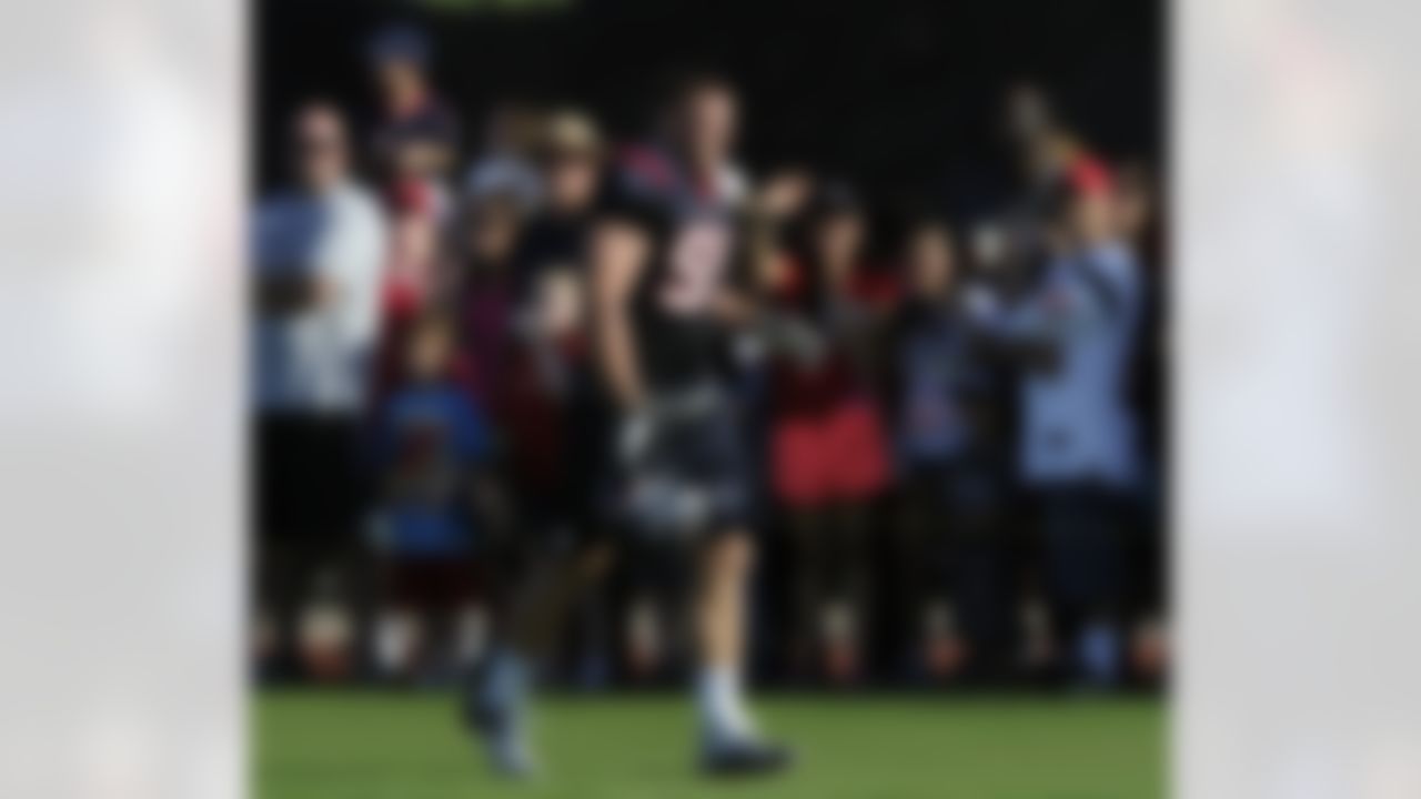 Houston Texans' J.J. Watt (99) is cheered by fans at training camp Monday, July 30, 2012, in Houston. (AP Photo/Pat Sullivan)