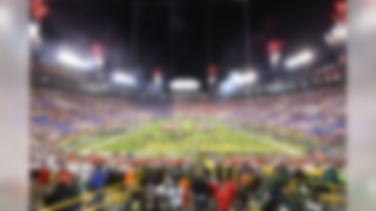 Fans at legendary Lambeau Field honor the military with a coordinated red, white and blue display complete with fireworks before  the Green Bay Packers' game against the Chicago Bears. (Todd Rosenberg/NFL)