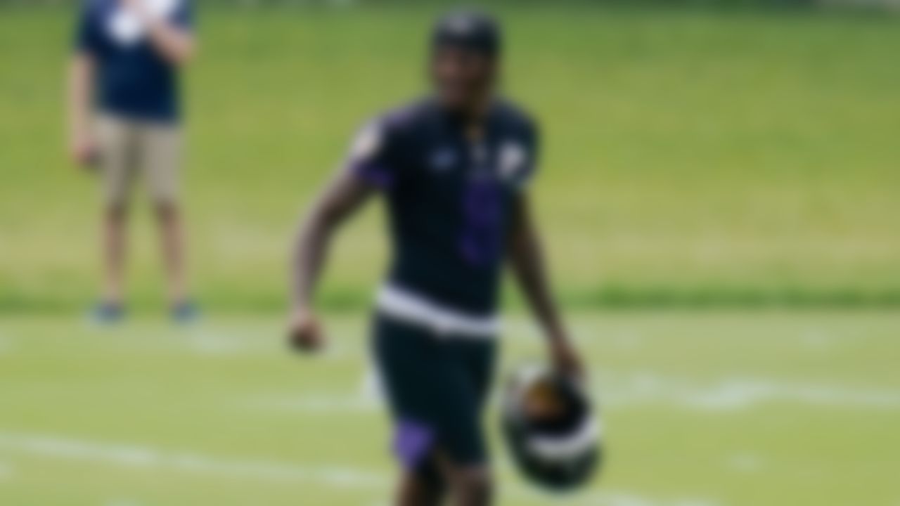 Baltimore Ravens quarterback Lamar Jackson heads to a practice field on Tuesday, June 8, 2021, in Owings Mills, Md.