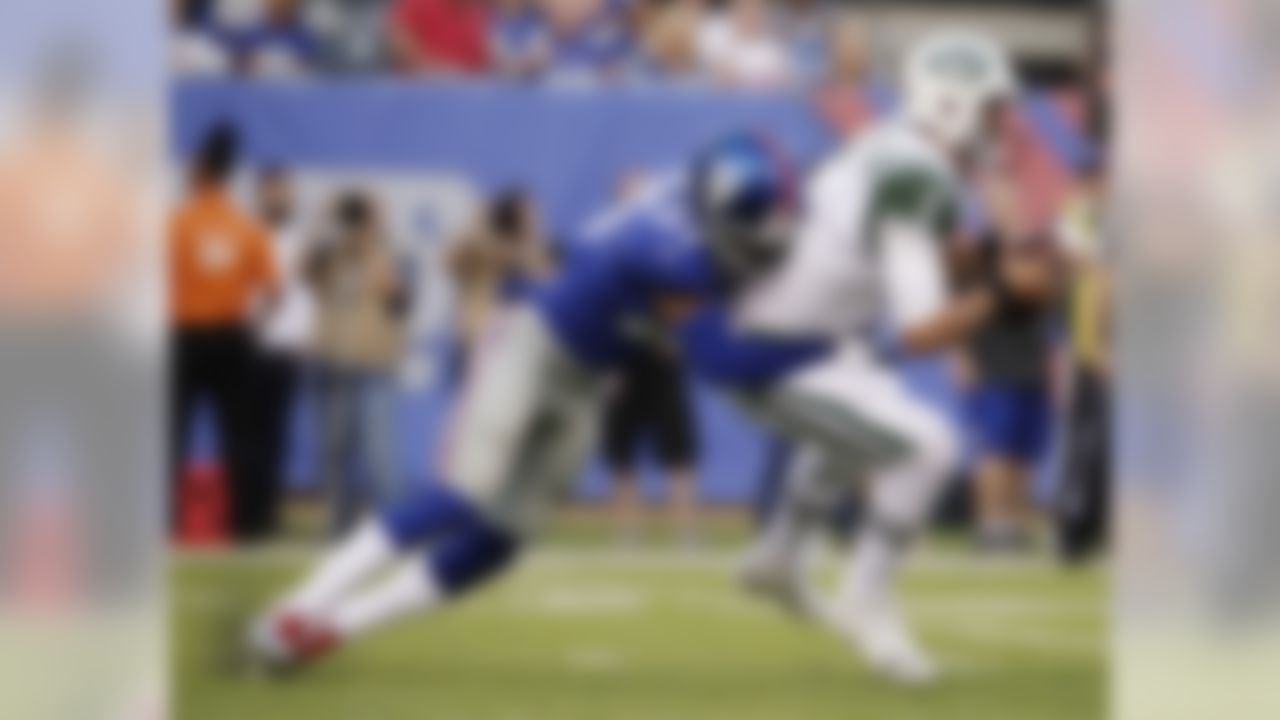 New York Giants free safety Darian Thompson (27) sacks New York Jets quarterback Christian Hackenberg (5) during the first half of a preseason NFL football game Saturday, Aug. 26, 2017, in East Rutherford, N.J. (AP Photo/Julio Cortez)