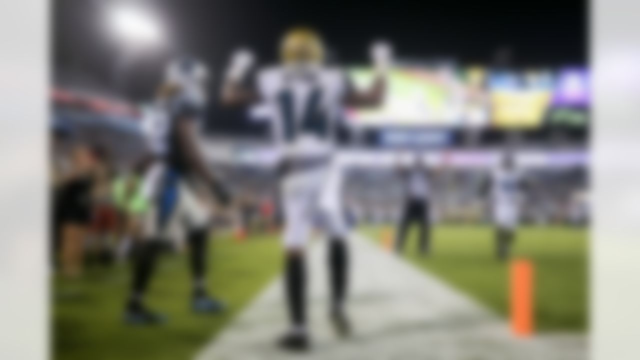 Jacksonville Jaguars wide receiver Shane Wynn (14) celebrates after scoring a touchdown during a NFL preseason game against the Carolina Panthers, Thursday, Aug. 24, 2017 in Jacksonville, Fla. (Logan Bowles / NFL)