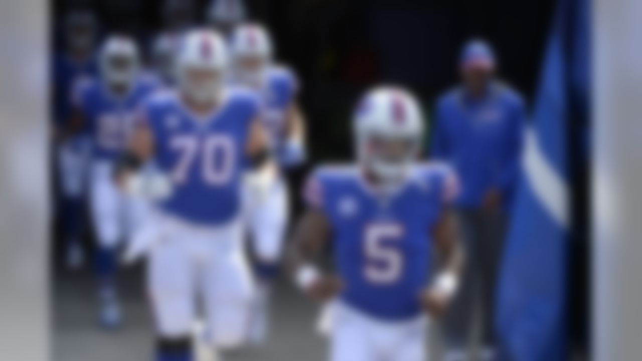 Buffalo Bills quarterback Tyrod Taylor (5) takes the field with teammates before an NFL football game against the New York Jets Sunday, Sept. 10, 2017, in Orchard Park, N.Y. (AP Photo/Adrian Kraus)