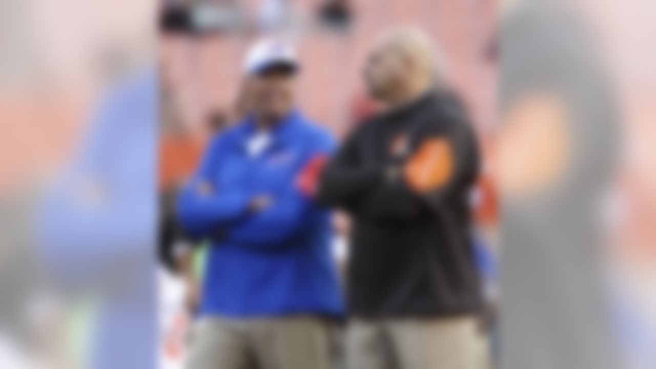 Buffalo Bills coach Rex Ryan, left, talks with Cleveland Browns coach Mike Pettine before an NFL preseason football game between their teams Thursday, Aug. 20, 2015, in Cleveland. (AP Photo/Ron Schwane)