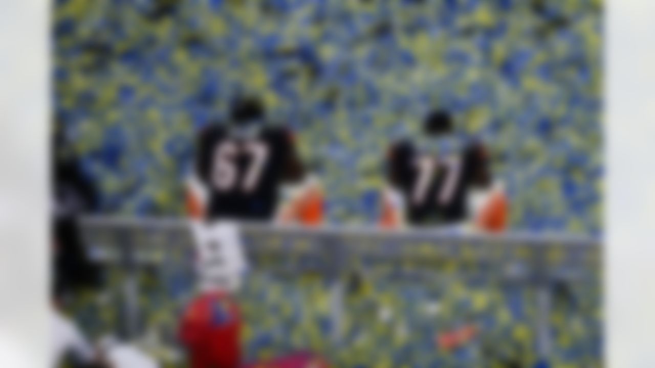 Cincinnati Bengals offensive guard Quinton Spain (67) and offensive guard Hakeem Adeniji (77) sit on the bench following Super Bowl LVI on Sunday, February 13, 2022 in Inglewood, California.