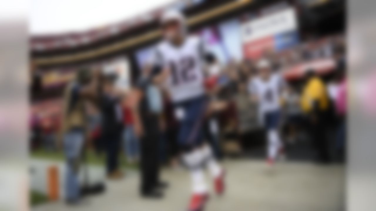 New England Patriots quarterback Tom Brady (12) takes the field ahead of an NFL football game between the Washington Redskins and the New England Patriots, Sunday, Oct. 6, 2019, in Washington. (AP Photo/Nick Wass)