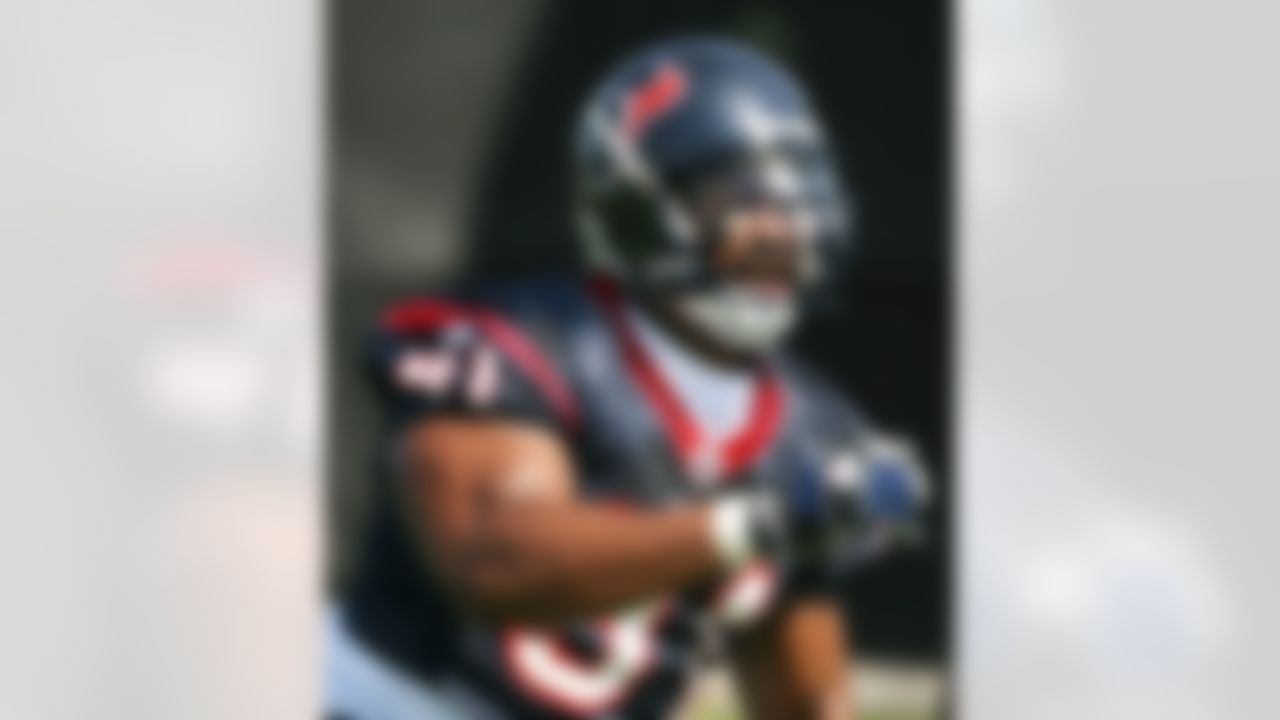HOUSTON - MAY 09: Defensive tackle  Amobi Okoye #91  of the Houston Texans runs drills during a morning practice session May 9, 2008 in Houston, Texas.  (Photo by Bob Levey/Getty Images)