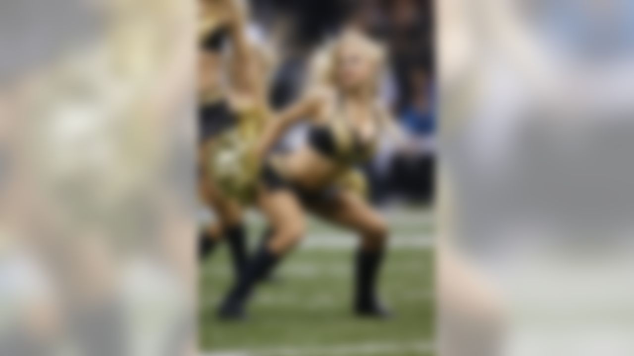 A New Orleans Saints cheerleader performs during an NFL football game against the Carolina Panthers at the Mercedes-Benz Superdome on Sunday, Dec. 8, 2013, in New Orleans, Louisiana. The Saints defeated the Panthers 31-13. (Perry Knotts/NFL)