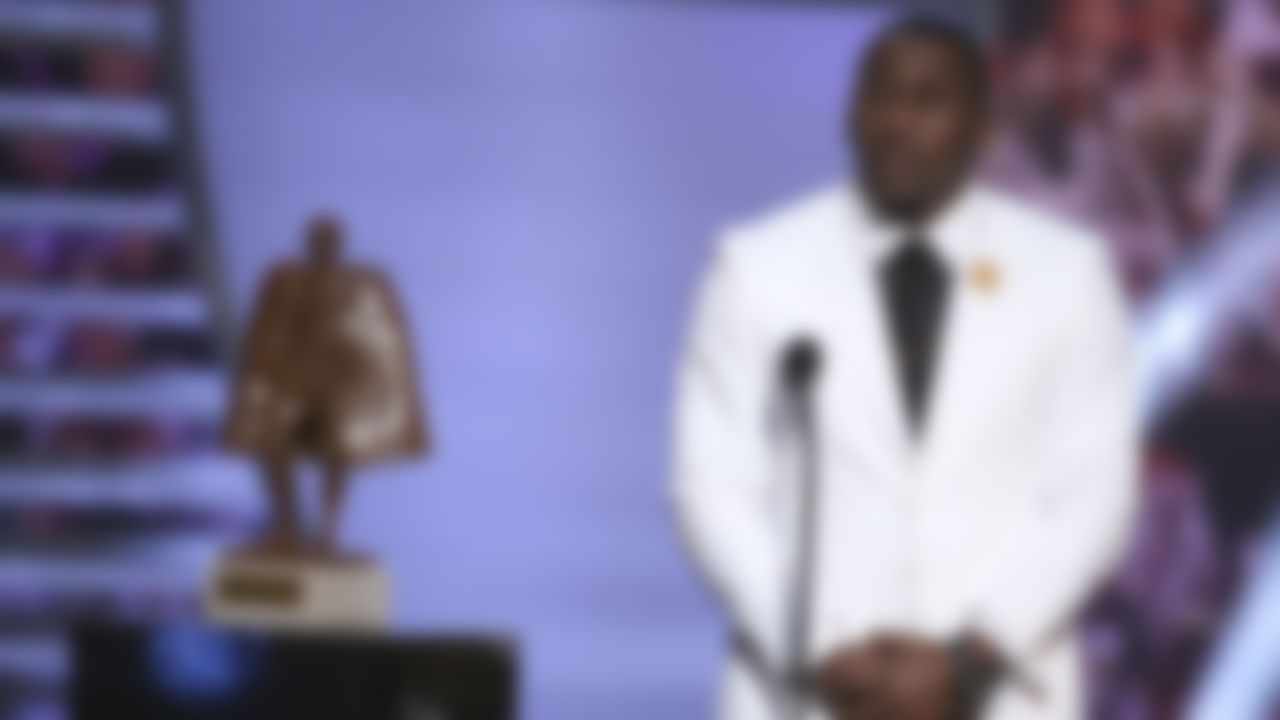 Carolina Panthers outside linebacker Thomas Davis (right) accepts the Walter Payton NFL Man of the Year during the 4th Annual NFL Honors awards show at the Phoenix Symphony Hall on Saturday, January 31, 2015 in Phoenix, AZ.