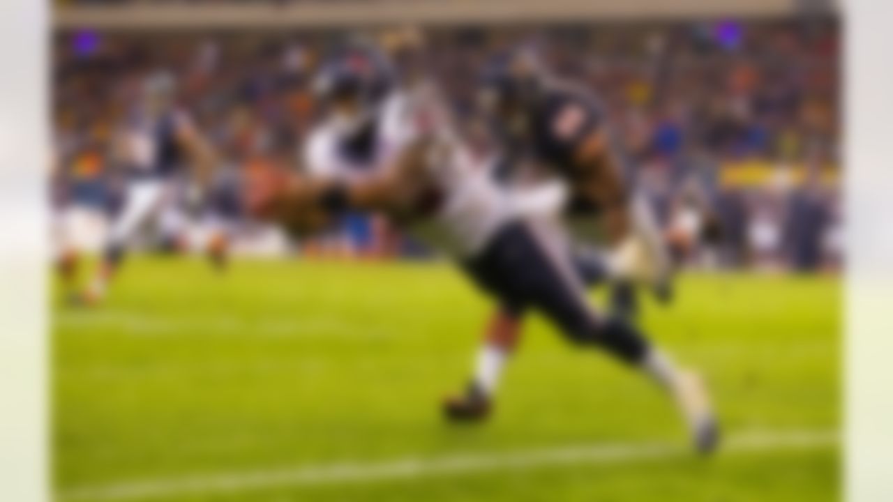 Running back Arian Foster #23 of the Houston Texans dives into the end zone for a touchdown during week ten action between the Houston Texans and Chicago Bears at Soldier Field in Chicago, IL on Nov. 11, 2012 (Todd Rosenberg/NFL)