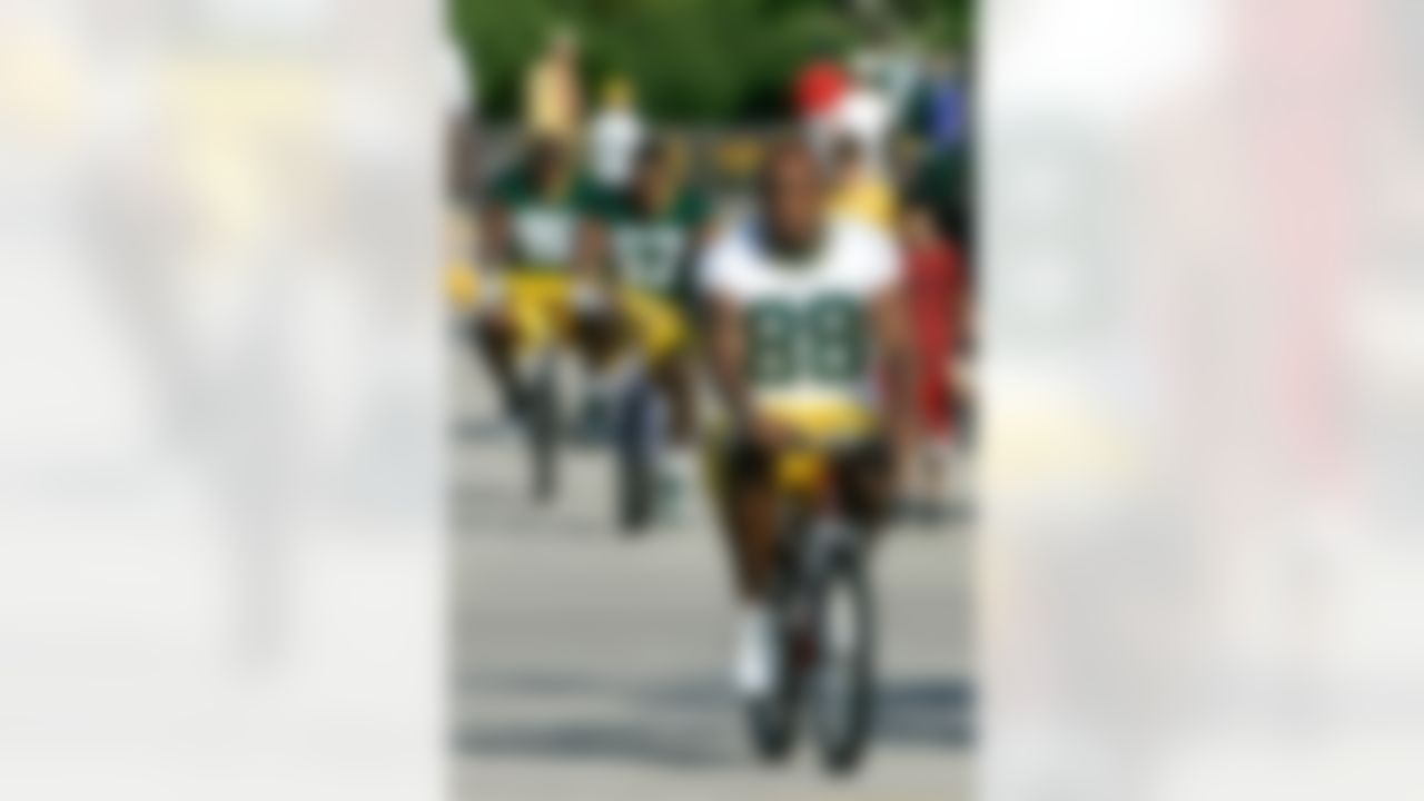 Green Bay Packers' Jermichael Finley (88) rides to football training camp Monday, July 28, 2008, in Green Bay, Wis. (AP Photo/Morry Gash)
