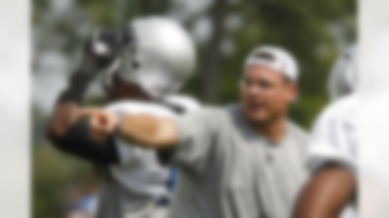 Detroit Lions defensive line coach Kris Kocurek directs during drills at the NFL football team's training camp facility in Allen Park, Mich., Sunday, Aug. 1, 2010. (AP Photo/Carlos Osorio)
