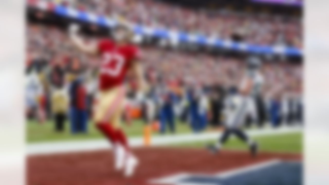 San Francisco 49ers running back Christian McCaffrey (23) celebrates during an NFL Super Wild Card Weekend playoff game against the Seattle Seahawks on Saturday, January 14, 2023 in Santa Clara, California.