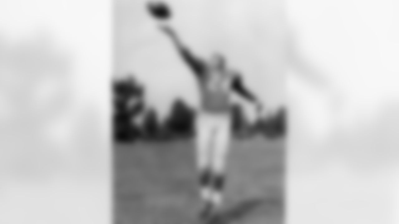 Detroit Lions safety Jack Christiansen (24) poses for a photo during training camp at Cranbrook Educational Community in Michigan, Aug. 12, 1958. (Pro Football Hall of Fame)