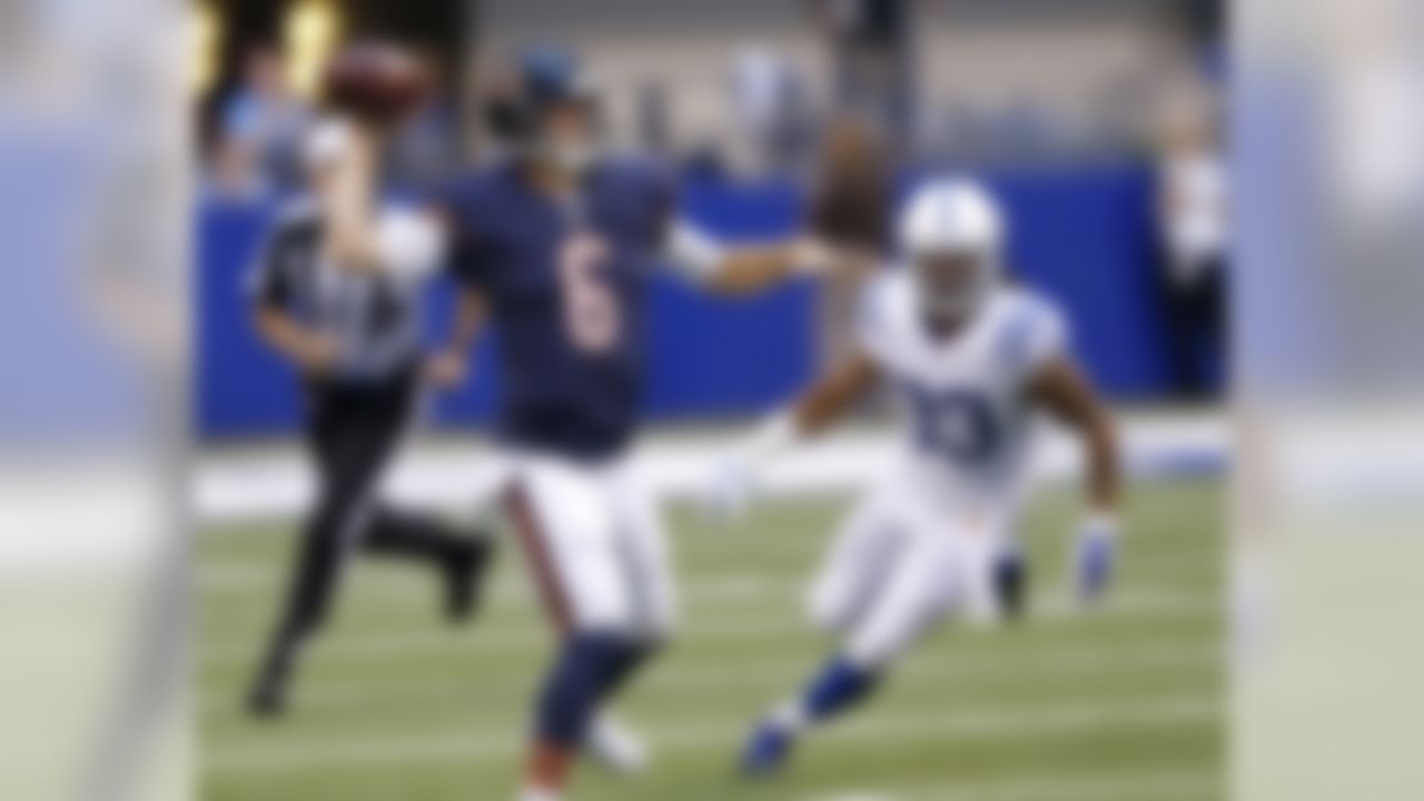 Indianapolis Colts defensive back Dwight Lowery (33) chases Chicago Bears quarterback Jay Cutler (6) during the first half of an NFL preseason football game in Indianapolis, Saturday, Aug. 22, 2015. (AP Photo/Sam Riche)