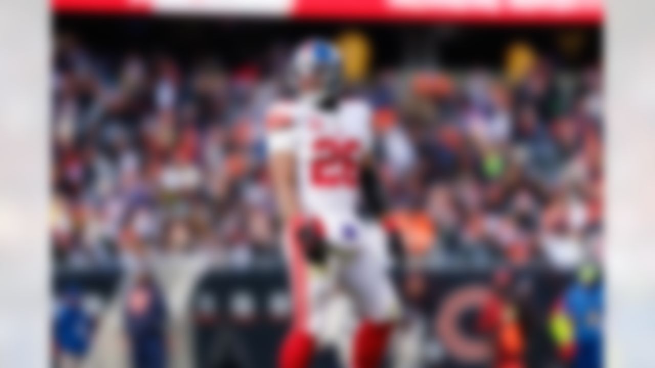 New York Giants running back Saquon Barkley (26) looks on during an NFL football game against the Chicago Bears on Sunday, January 2, 2022 in Chicago, Illinois.