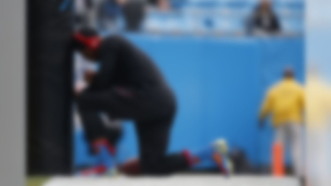 Carolina Panthers quarterback Cam Newton (1) prays in the end zone during warm ups prior to an NFL football game against the New Orleans Saints at Bank of America Stadium on Sunday, Dec. 22, 2013, in Charlotte, North Carolina. (Perry Knotts/NFL)