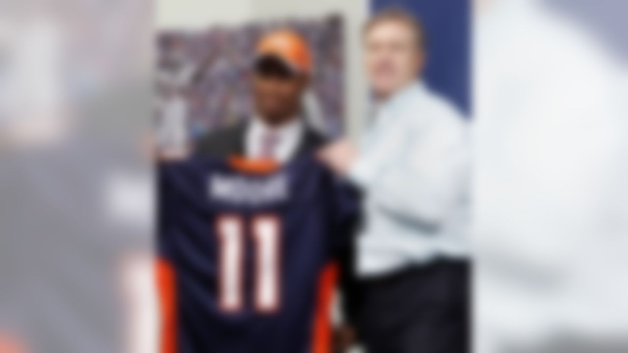 Denver Broncos vice president John Elway, right, holds up a jersey with second round draft pick Rahim Moore, a safety from UCLA, during an NFL football news conference at the team's headquarters in Englewood, Colo., on Saturday, April 30, 2011. (AP Photo/Ed Andrieski)
