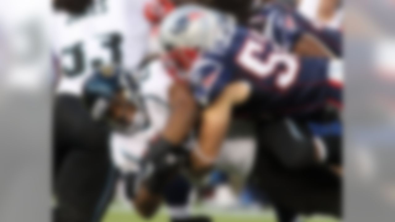 Aug 11, 2011; Foxborough, MA, USA; New England Patriots linebacker Dane Fletcher (52) tackles Jacksonville Jaguars running back Rashad Jennings (23) during the first quarter at Gillette Stadium. Mandatory Credit: Stew Milne-US PRESSWIRE