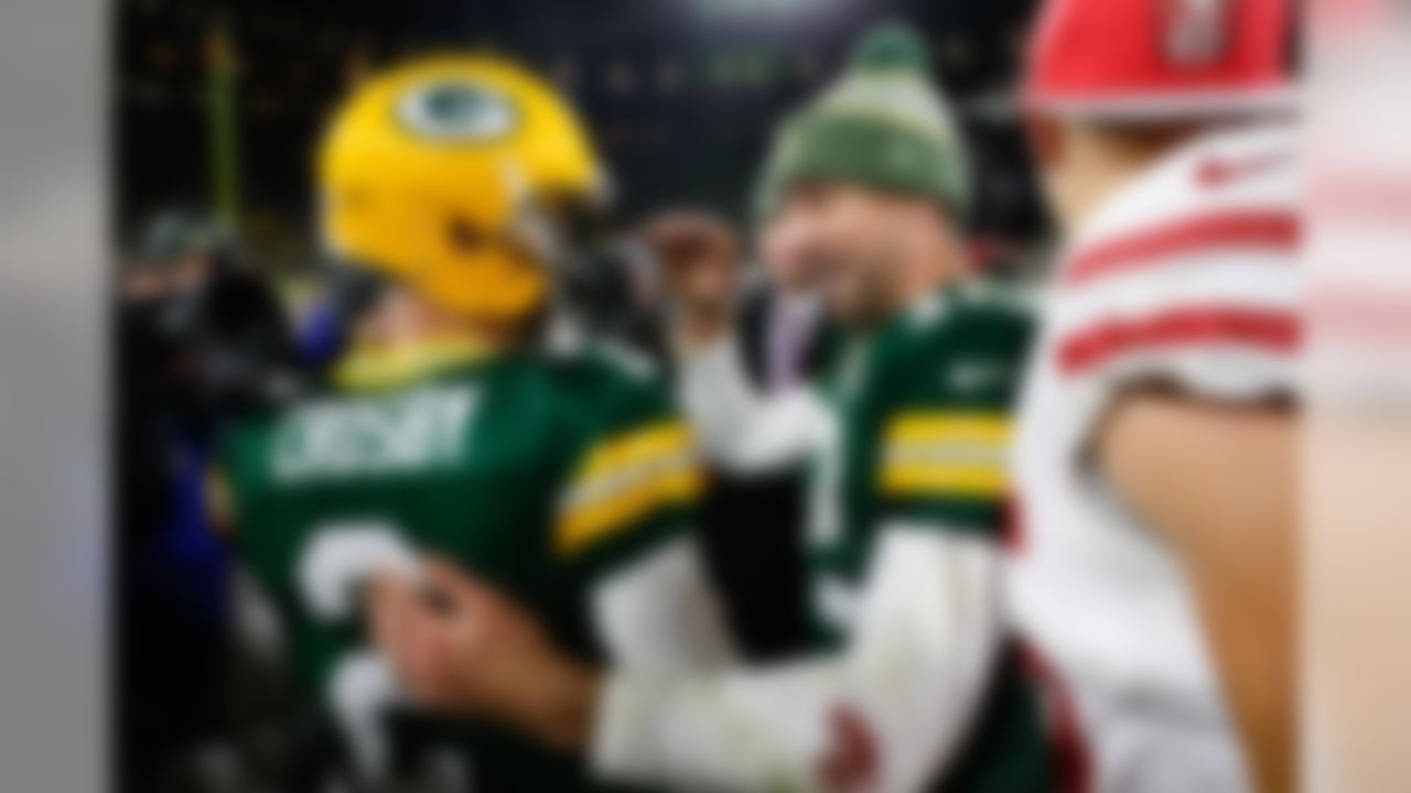 Green Bay Packers quarterback Aaron Rodgers (12) celebrates with kicker Mason Crosby (2) after kicking the winning field goal following an NFL football game against the San Francisco 49ers on Monday, Oct. 15, 2018, in Green Bay, Wis. (Ryan Kang/NFL)