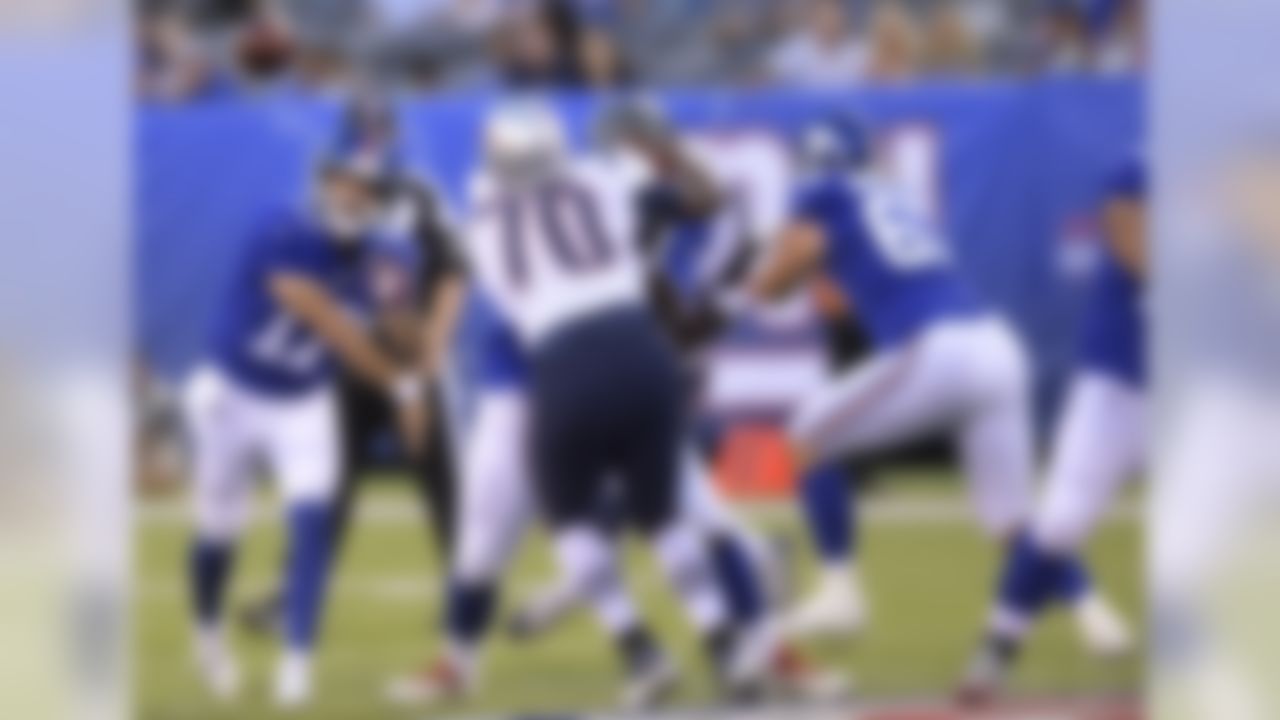 New York Giants quarterback Kyle Lauletta throws a pass against the New England Patriots during the first half of an NFL football game, Thursday, Aug. 30, 2018, in East Rutherford. (AP Photo/Bill Kostroun)