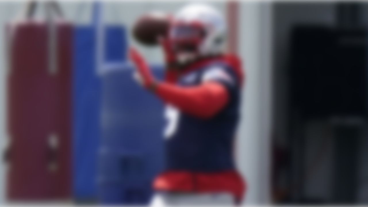 New England Patriots linebacker Matt Judon winds up to pass the ball during an NFL football practice in Foxborough, Mass., Thursday, June 10, 2021.