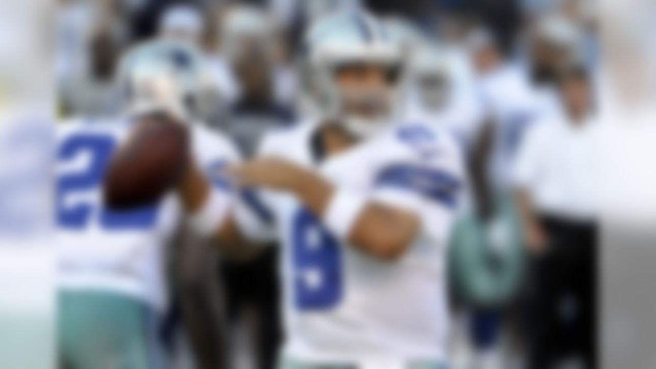 Dallas Cowboys quarterback Tony Romo looks for a receiver during the first quarter of a NFL preseason football game against the San Diego Chargers Saturday, Aug. 18, 2012 in San Diego. (AP Photo/Denis Poroy)