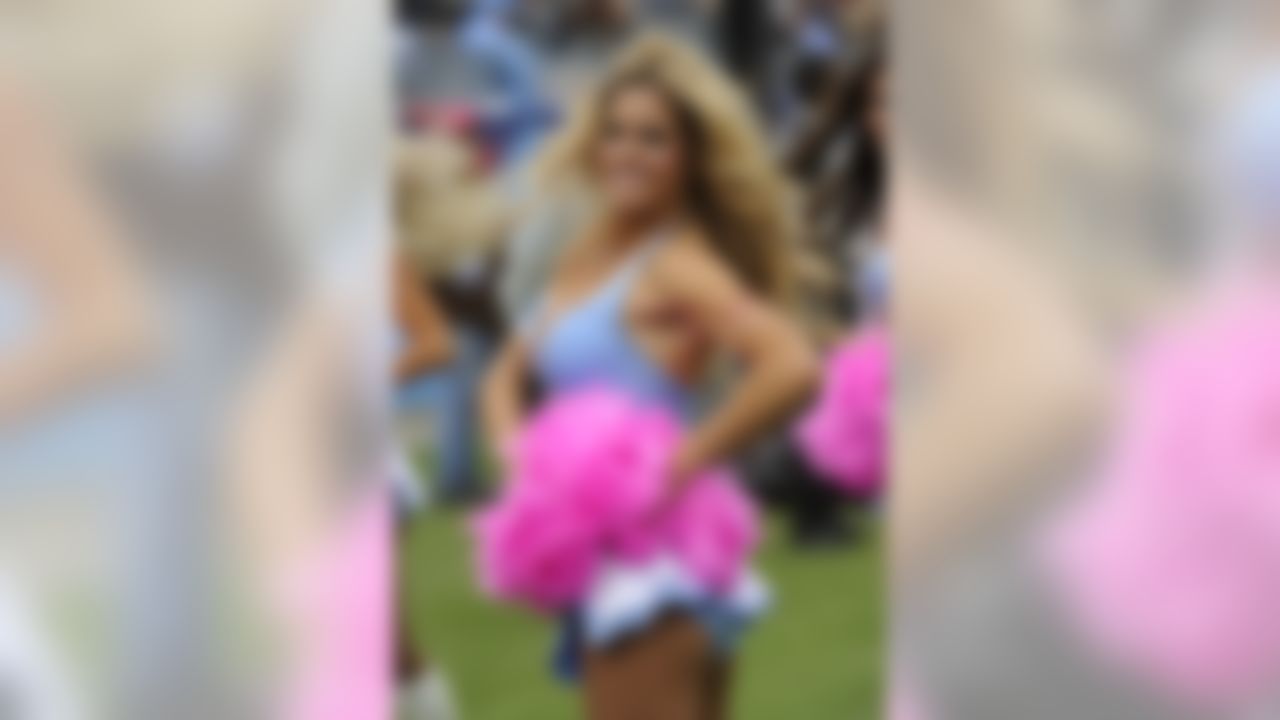 A Tennessee Titans cheerleader performs in the fourth quarter of an NFL football game against the Denver Broncos on Sunday, Oct. 3, 2010, in Nashville, Tenn. (AP Photo/Frederick Breedon)