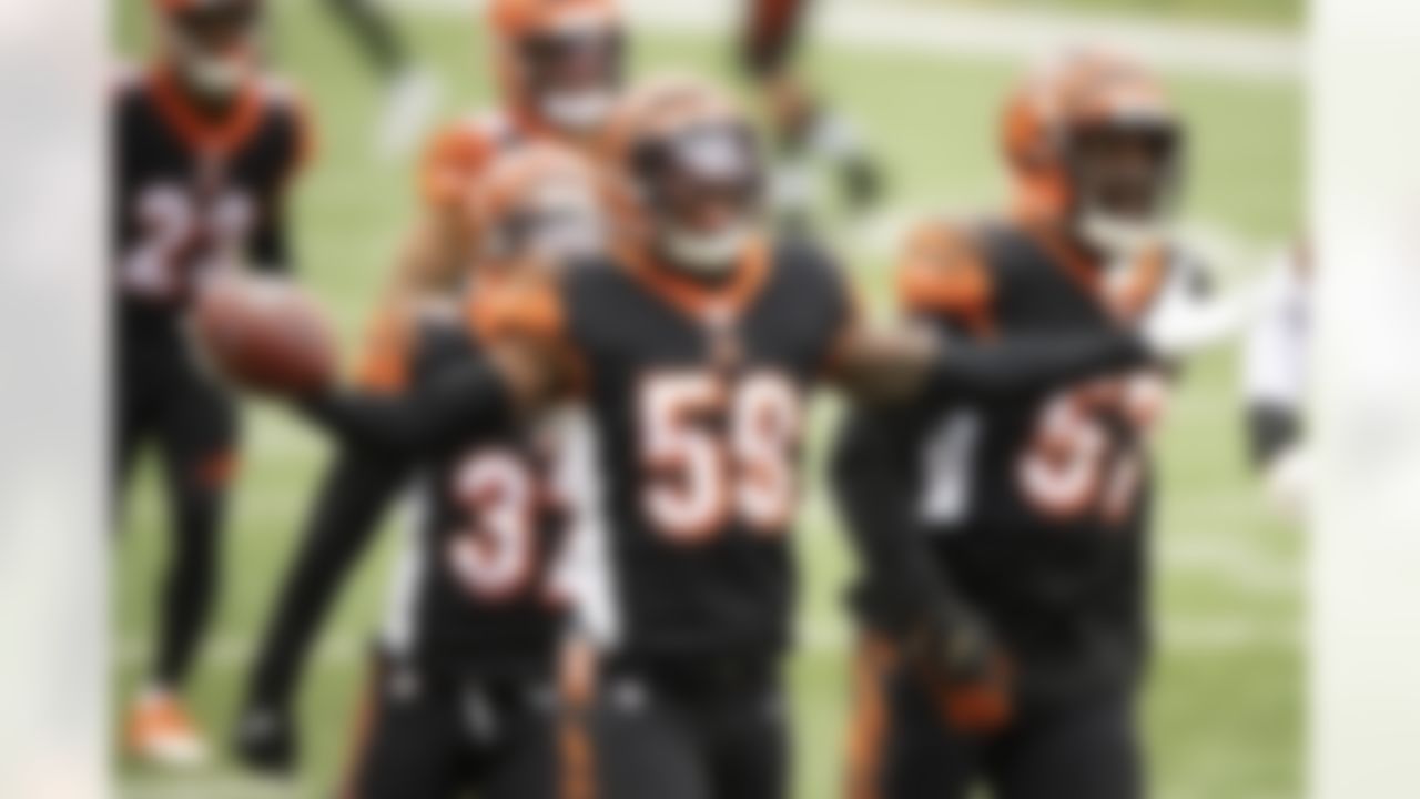 Cincinnati Bengals linebacker Akeem Davis-Gaither (59) celebrates an interception during an NFL football game against the Baltimore Ravens, Sunday, Jan. 3, 2021, in Cincinnati.