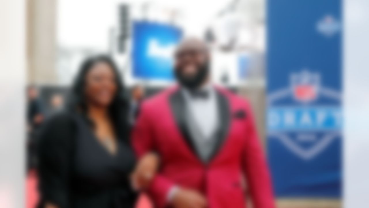 Alabama defensive tackle A'Shawn Robinson walks on the red carpet with his mother during the 2016 NFL Draft at the Auditorium Theatre on Thursday, April 28, 2016 in Chicago. (Ben Liebenberg/NFL)