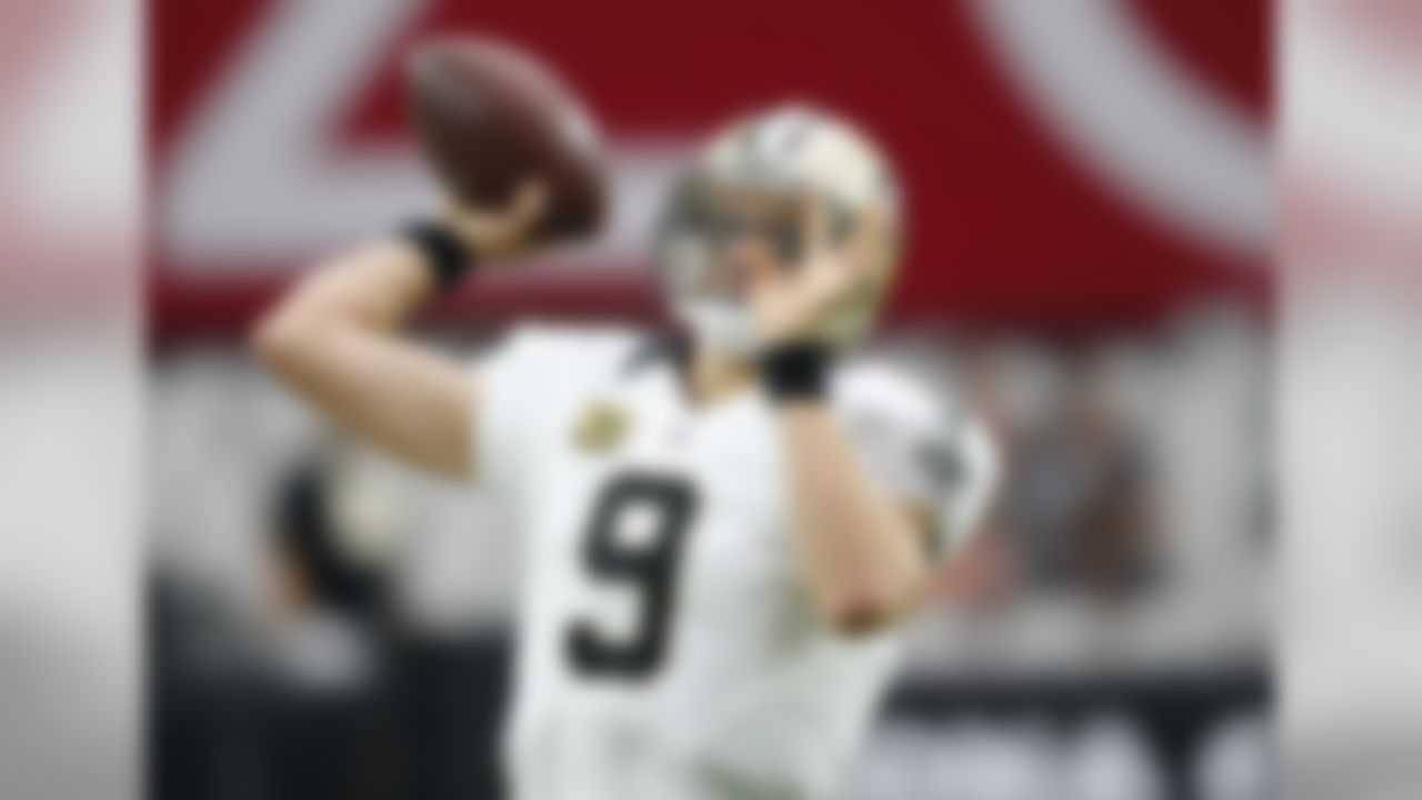 New Orleans Saints quarterback Drew Brees (9) warms up prior to an NFL football game against the Arizona Cardinals, Sunday, Sept. 13, 2015, in Glendale, Ariz. (AP Photo/Ross D. Franklin)