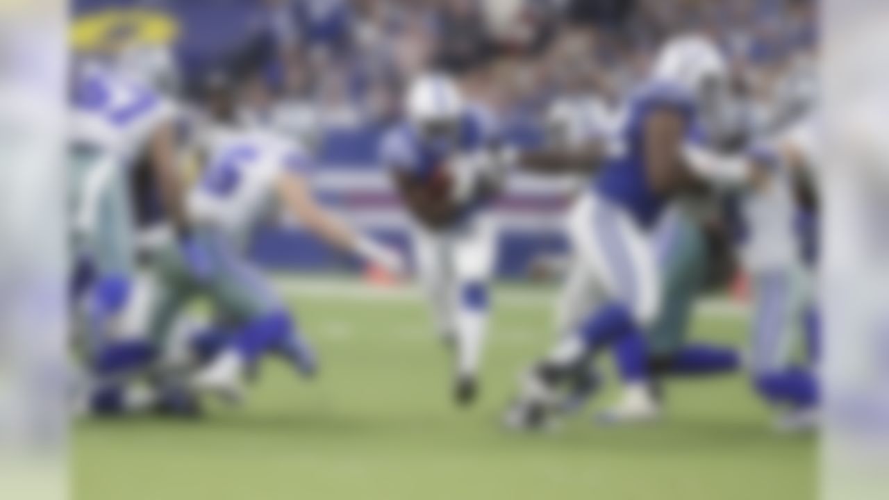 Indianapolis Colts' Marlon Mack (25) runs against Dallas Cowboys' Leighton Vander Esch (55) during the second half of an NFL football game, Sunday, Dec. 16, 2018, in Indianapolis. (AP Photo/Michael Conroy)