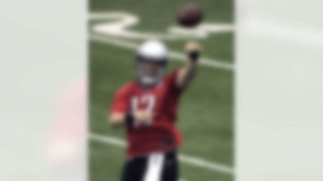 Detroit Lions quarterback Kellen Moore passes the ball during training camp at the team's NFL football practice facility in Allen Park, Mich., Friday, July 27, 2012. (AP Photo/Carlos Osorio)