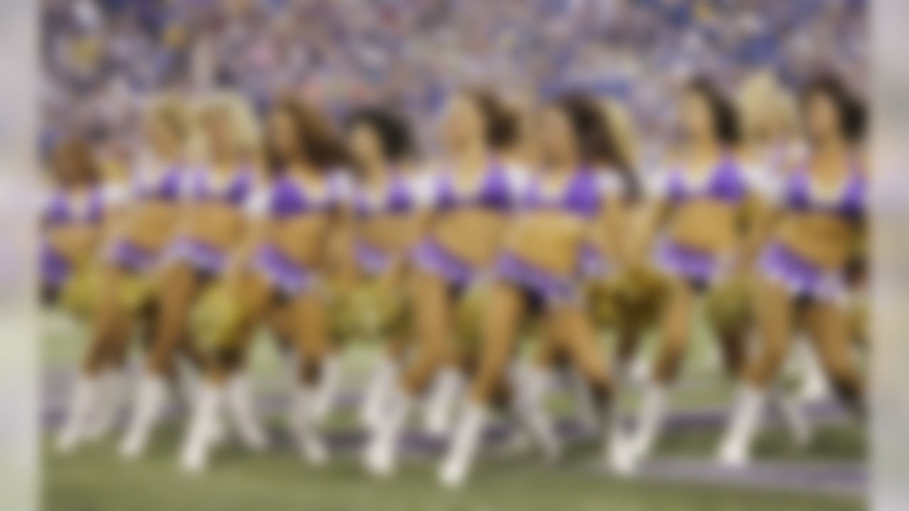 Minnesota Vikings cheerleaders perform during the first half of an NFL preseason football game between the Minnesota Vikings and the Tennessee Titans Thursday, Aug. 29, 2013, in Minneapolis. (AP Photo/Ann Heisenfelt)