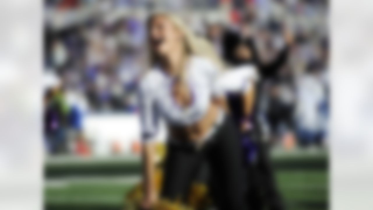 Baltimore Ravens cheerleaders perform during the first half of an NFL wild card playoff football game against the Baltimore Ravens, Sunday, Jan. 6, 2013, in Baltimore. (AP Photo/Nick Wass)