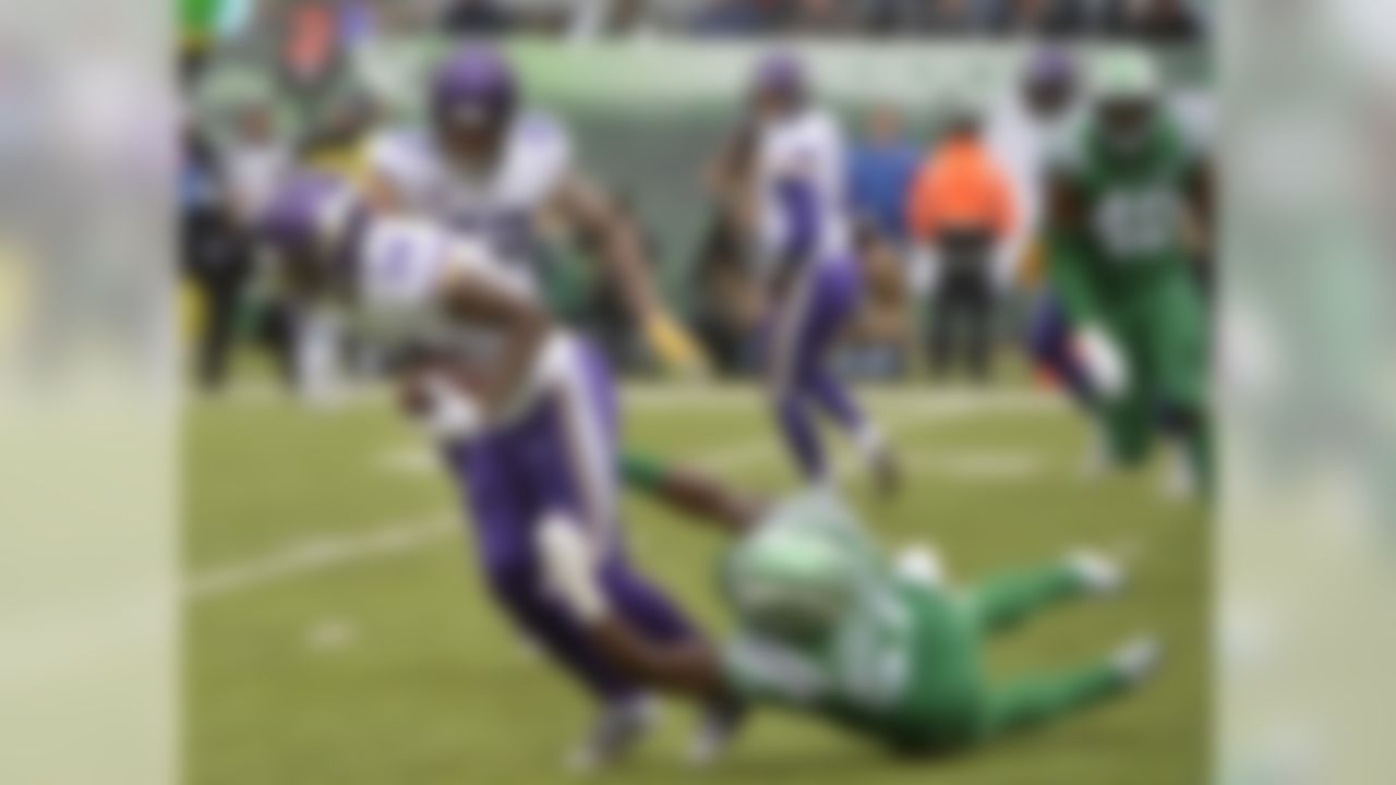 New York Jets outside linebacker Brandon Copeland (51) tackles Minnesota Vikings wide receiver Stefon Diggs (14) during the first half of an NFL football game Sunday, Oct. 21, 2018, in East Rutherford, N.J. (AP Photo/Howard Simmons)