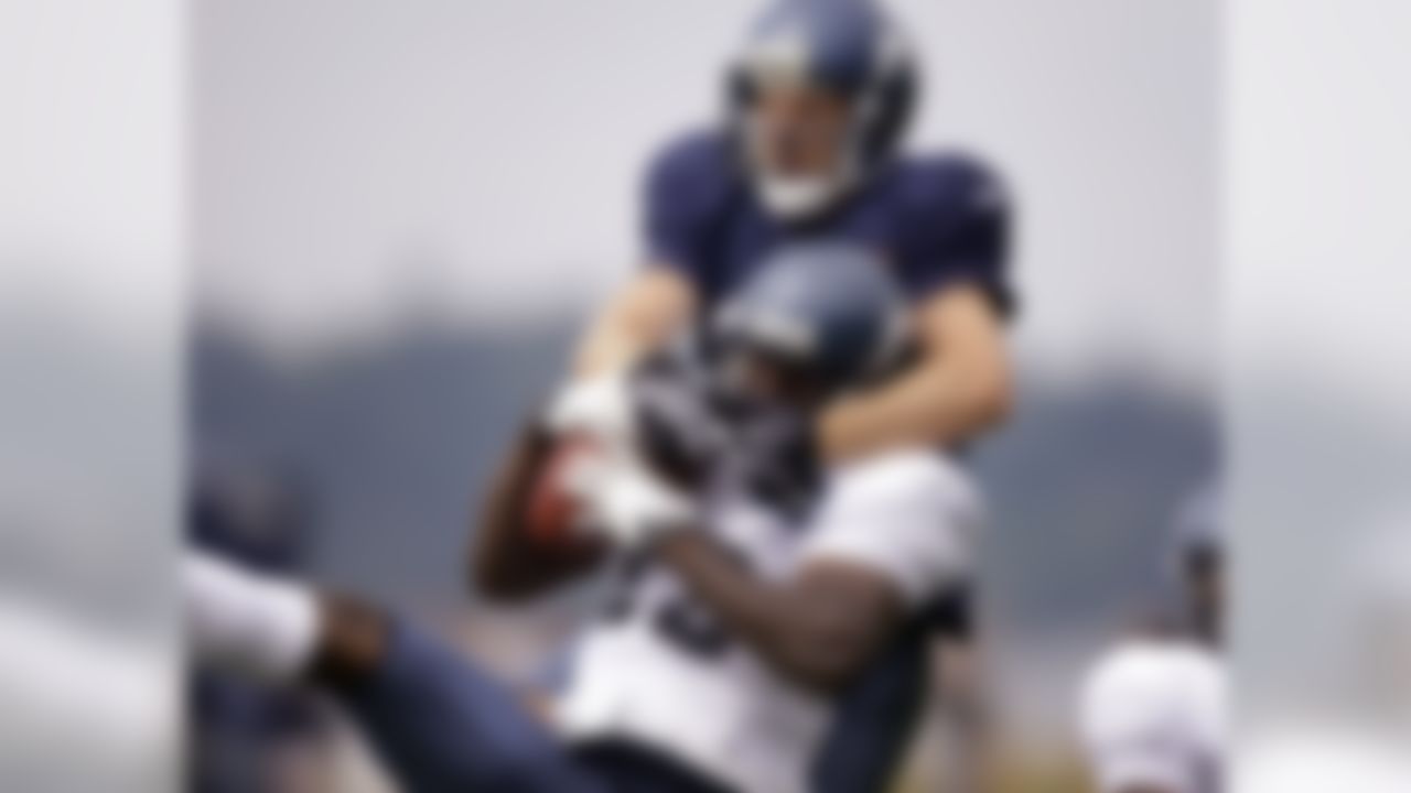 Seattle Seahawks' Marcus Trufant, bottom, intercepts a pass meant for Kole Heckendorf during an NFL football practice Friday, Aug. 6, 2010, in Renton, Wash. (AP Photo/Elaine Thompson)