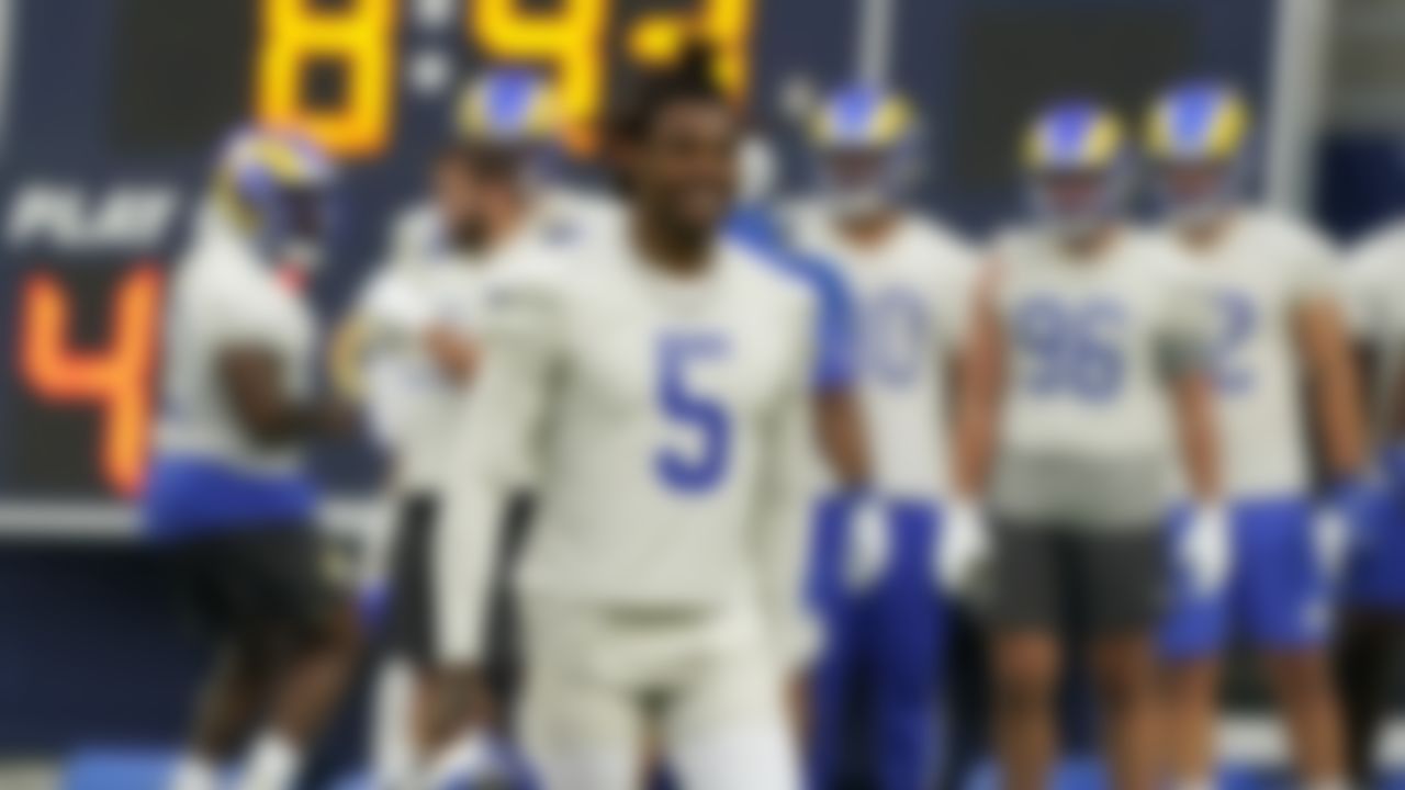 Los Angeles Rams cornerback Jalen Ramsey smiles as he walks off the field during NFL football camp Thursday, June 10, 2021, in Inglewood, Calif.