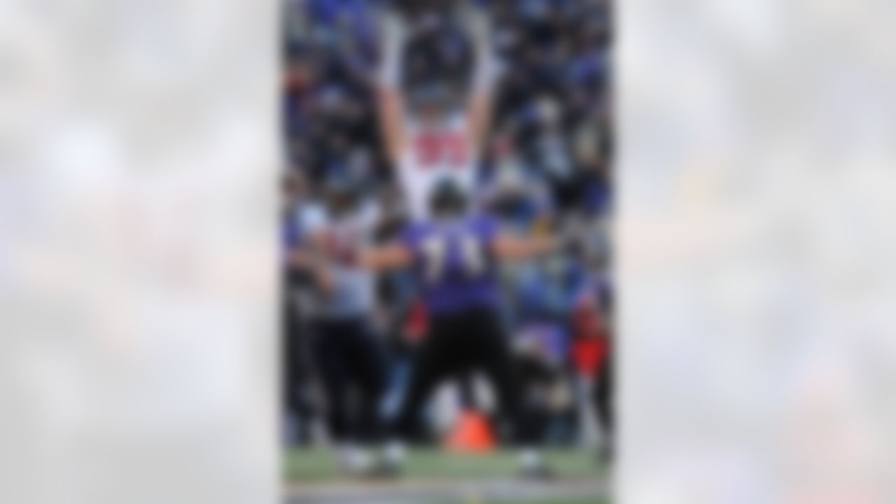 Houston Texans defensive end J.J. Watt #99 trying to block the football during the American Football Conference Divisional Playoff game between the Houston Texans and the Baltimore Ravens on Sunday, January 15 2012, at M & T Bank Stadium, Baltimore, Maryland. The Ravens beat the Texans 20-13. (AP Photo/David Drapkin)