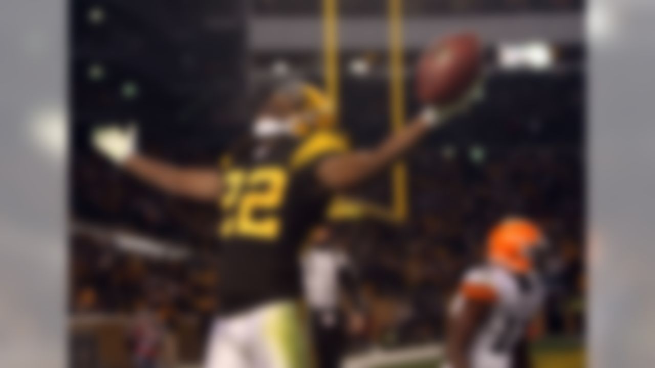 Dec 8, 2011; Pittsburgh , PA, USA; Pittsburgh Steelers cornerback William Gay (22) celebrates an interception in front of Cleveland Browns wide receiver Mohamed Massaquoi (11) during the second half of the game at Heinz Field. Pittsburgh won the game 14-3. Mandatory Credit: Jason Bridge-US PRESSWIRE