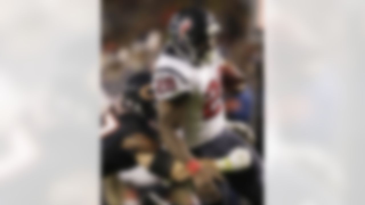 Houston Texans running back Justin Forsett (28) is tackled by Chicago Bears free safety Chris Conte (47)in the first half an NFL football game, Sunday, Nov. 11, 2012, in Chicago. (AP Photo/Nam Y. Huh)