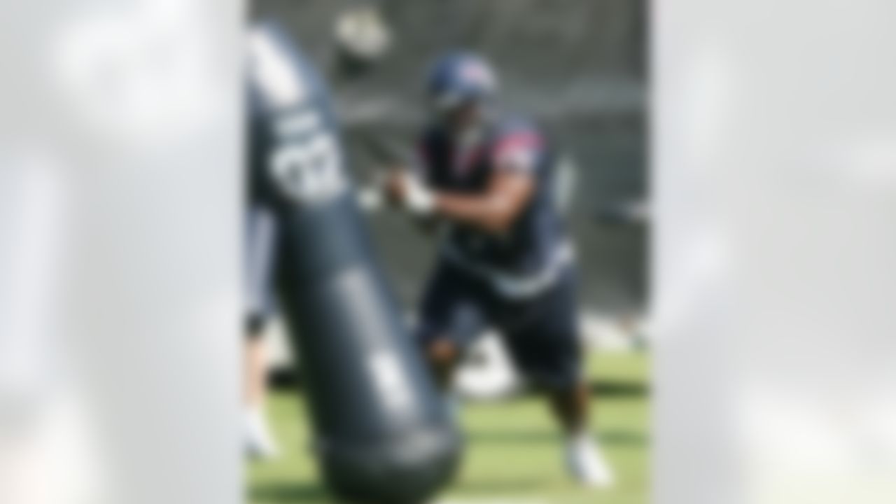 HOUSTON - MAY 09:  Rookie defensive tackle Frank Okam #79 of the Houston Texans runs drills during a morning practice session May 9, 2008 in Houston, Texas.  (Photo by Bob Levey/Getty Images)